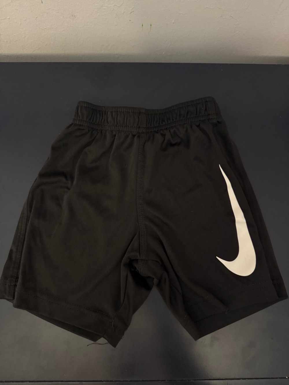 Nike Black Shorts with Large White Swoosh